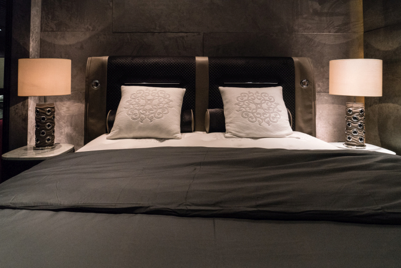 Repeated Cushions Reinforce an Already Divided Headboard