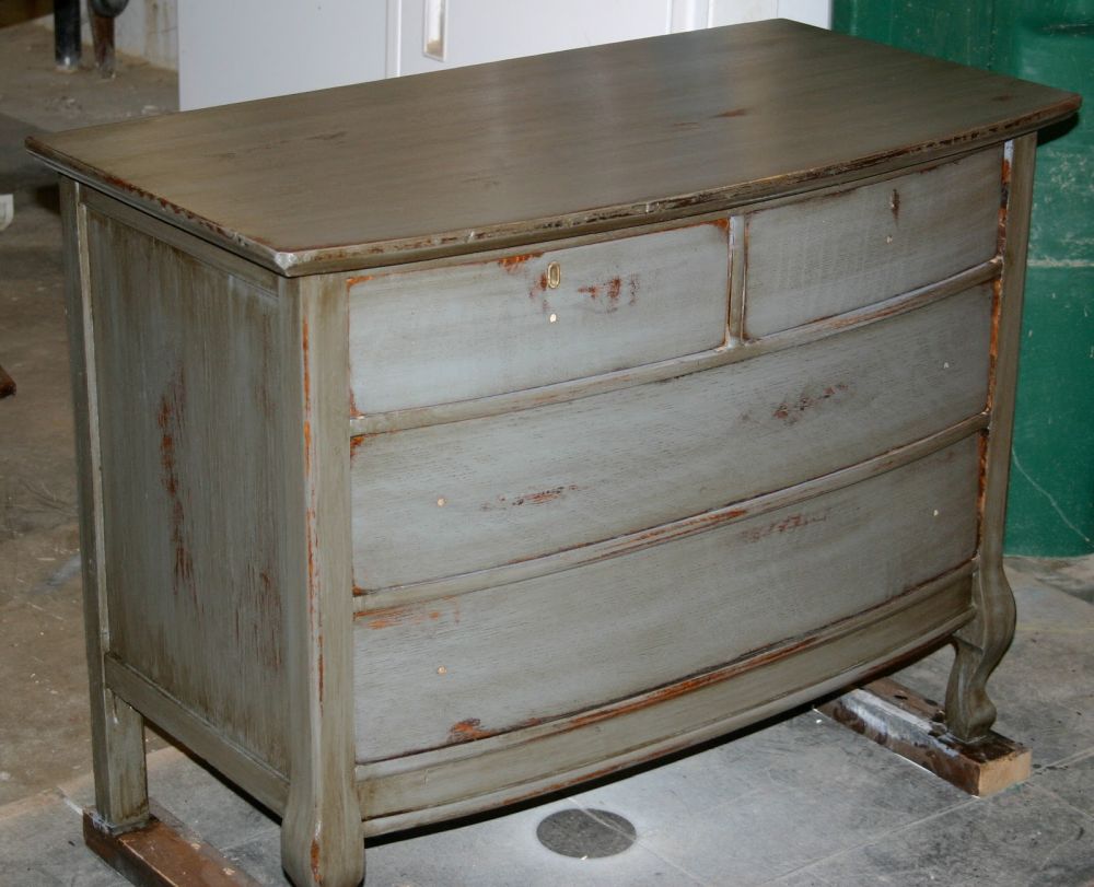 Sanded patches brought wood through the color