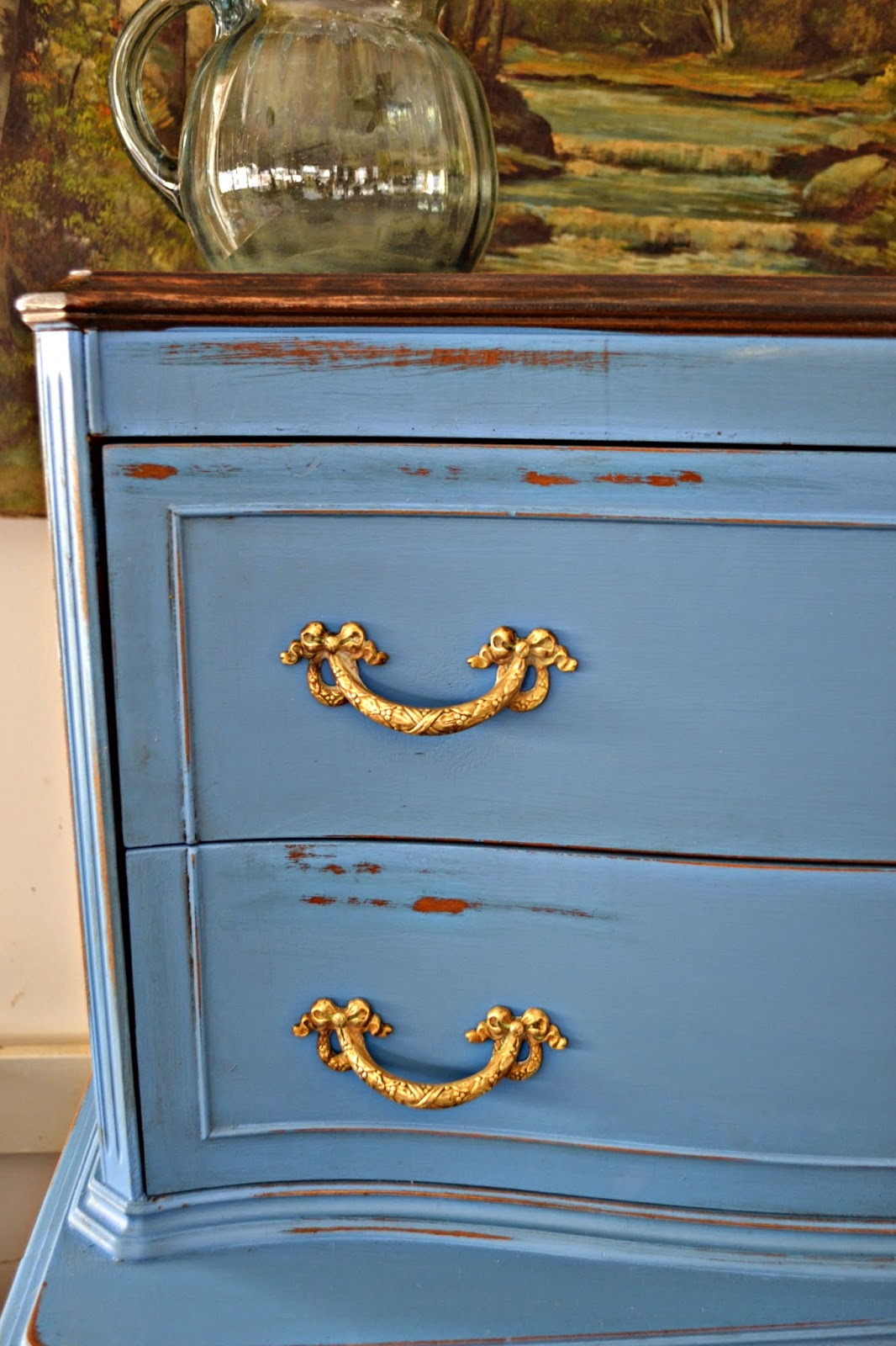 Sanding Exposed Brown Wood Beneath the Blue