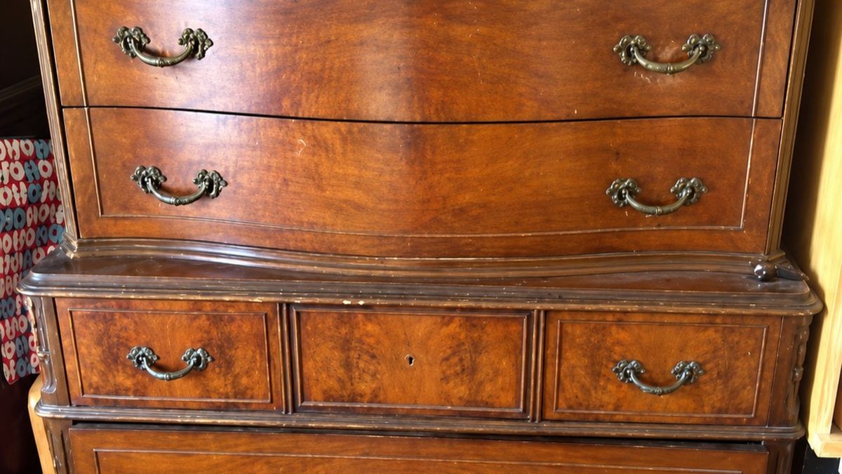 She Bought an Antique Mahogany Dresser to Paint Blue but Found Something From 1924 Inside