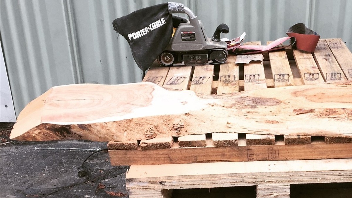 She Kept the Uneven Edges of a Walnut Slab and Turned It Into a Console Table With Black Hairpin Legs