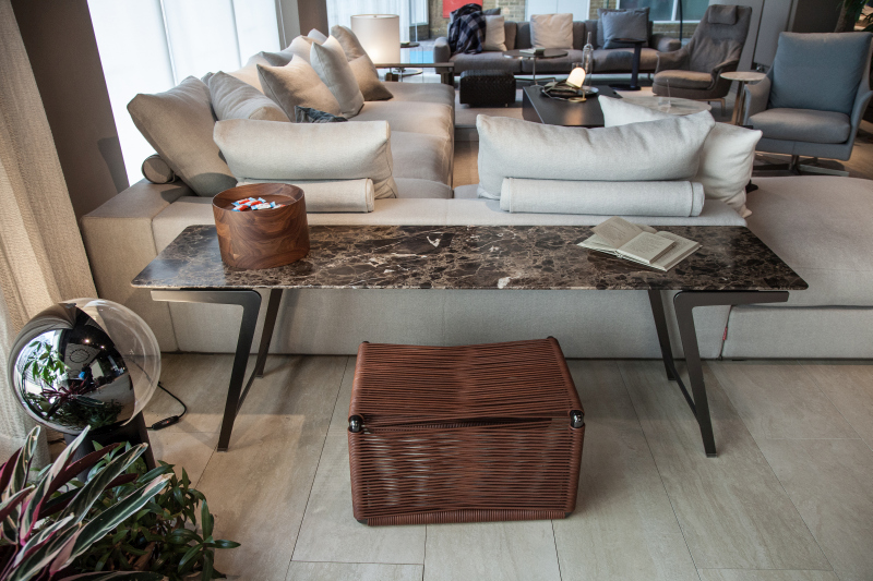The Back of the Sofa Becomes Part of the Arrangement