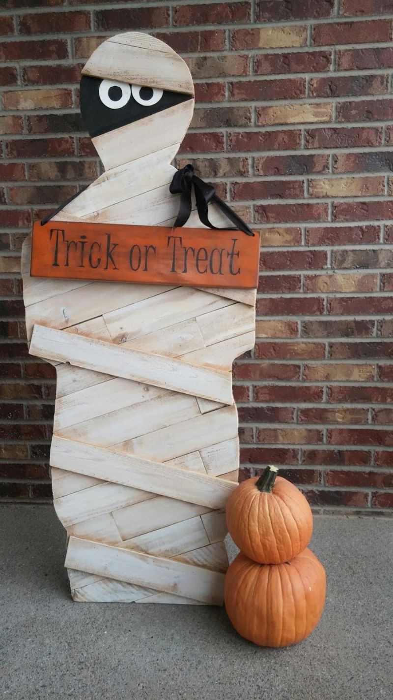 The Finished Mummy Stands on the Front Porch