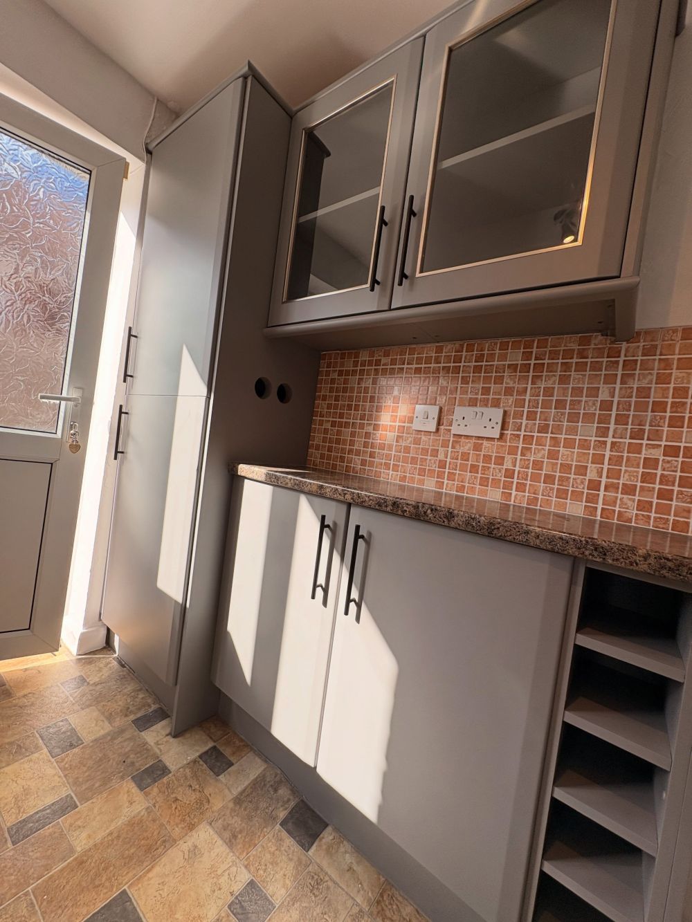 The Pantry and Glass Cabinets Received the Same Finish