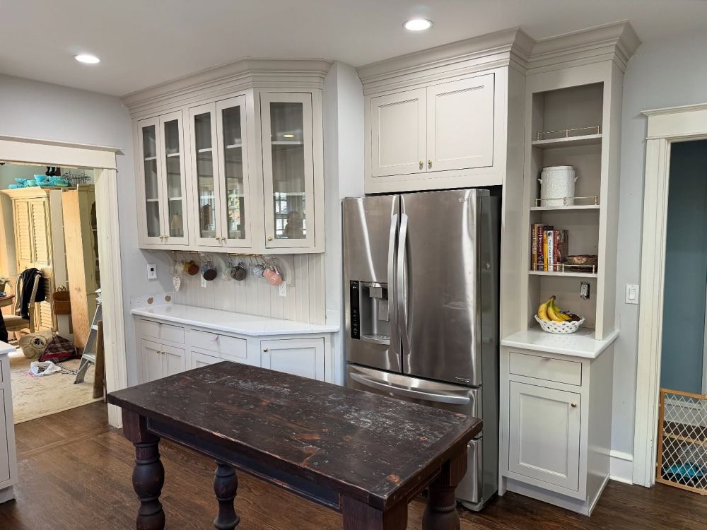 The finished refrigerator wall has pale