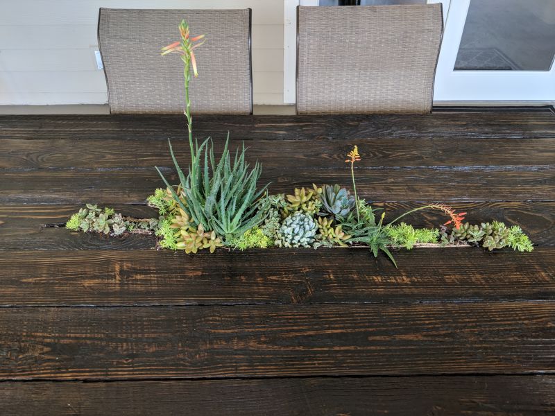 The finished table became part of the covered patio