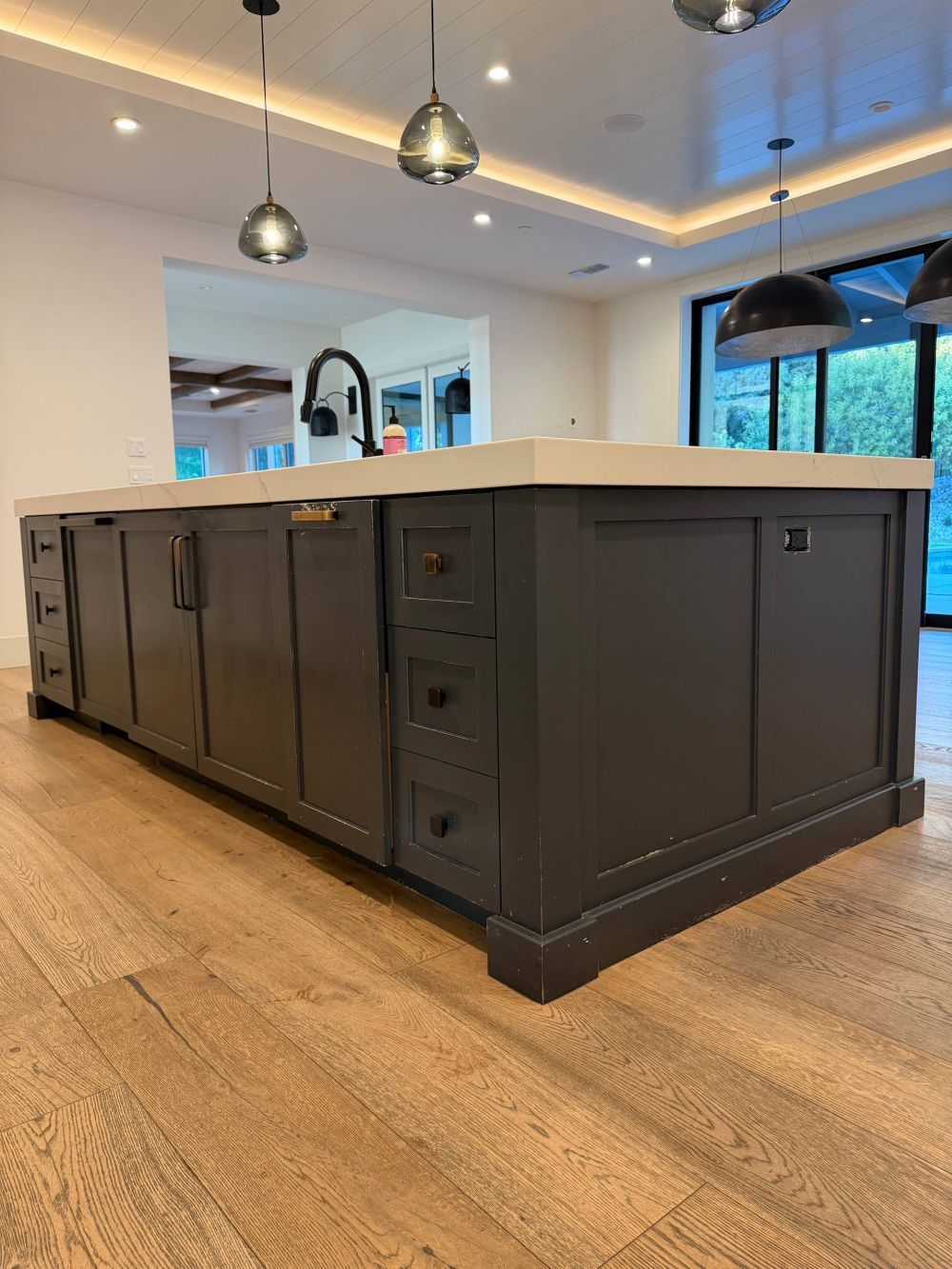 The opposite side of the island had a built-in dishwasher