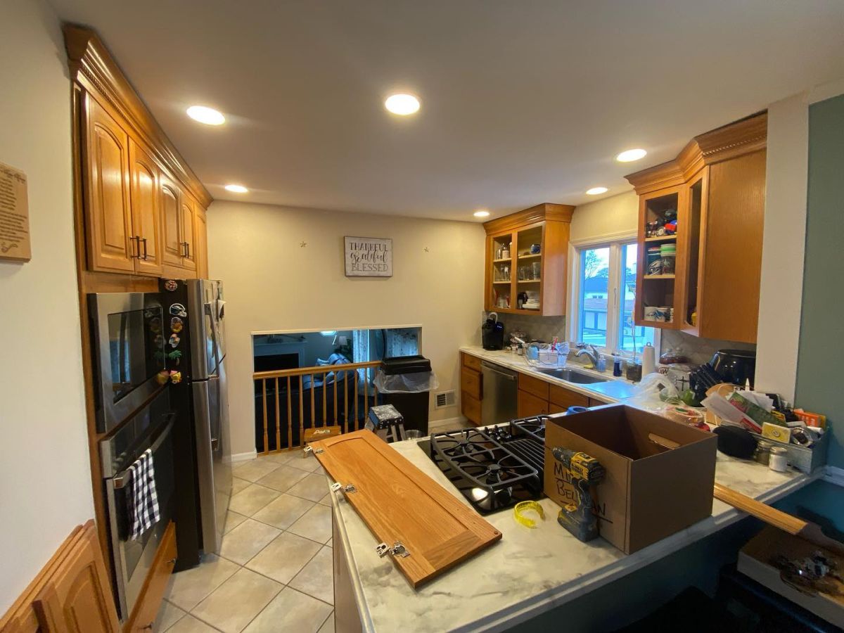 The opposite view shows the existing white countertops