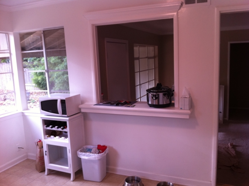 The pass-through occupied a wall without useful storage