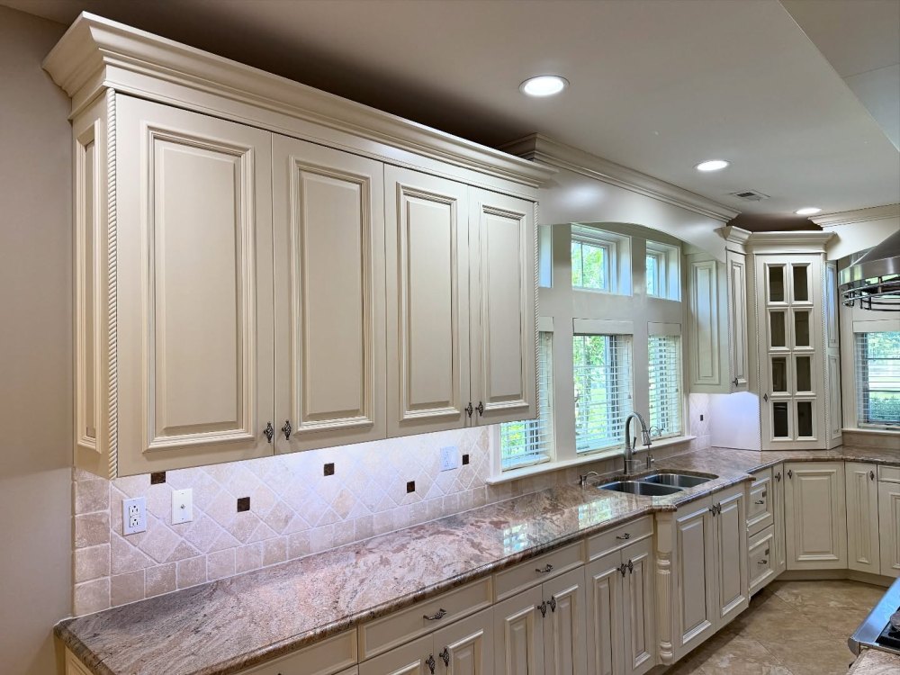 The sink wall shows how the warm off-white paint