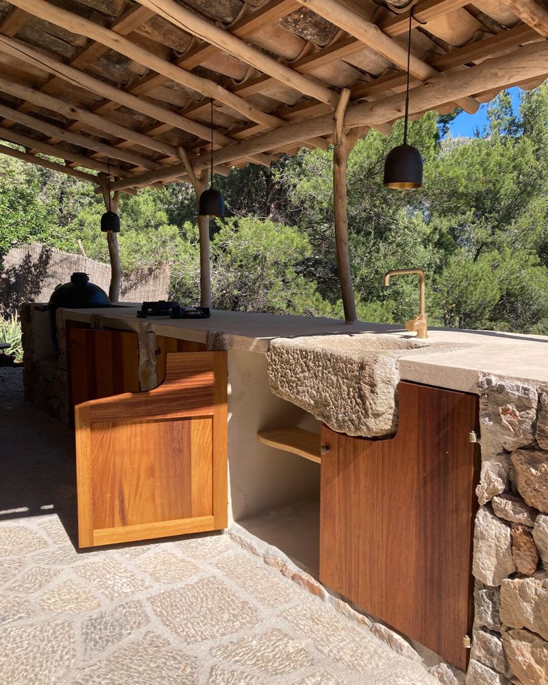 Thick Iroko Doors Conceal the Storage Beneath