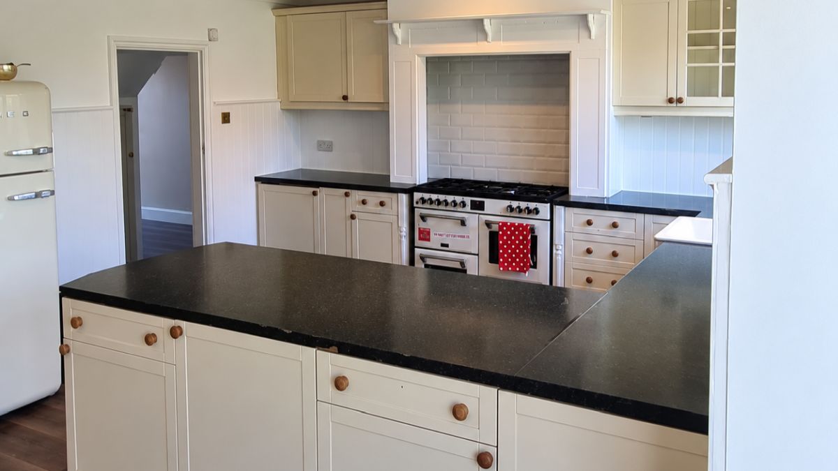 This Cream Kitchen Got a Deep Blue Redo and Almost Nothing Else Changed