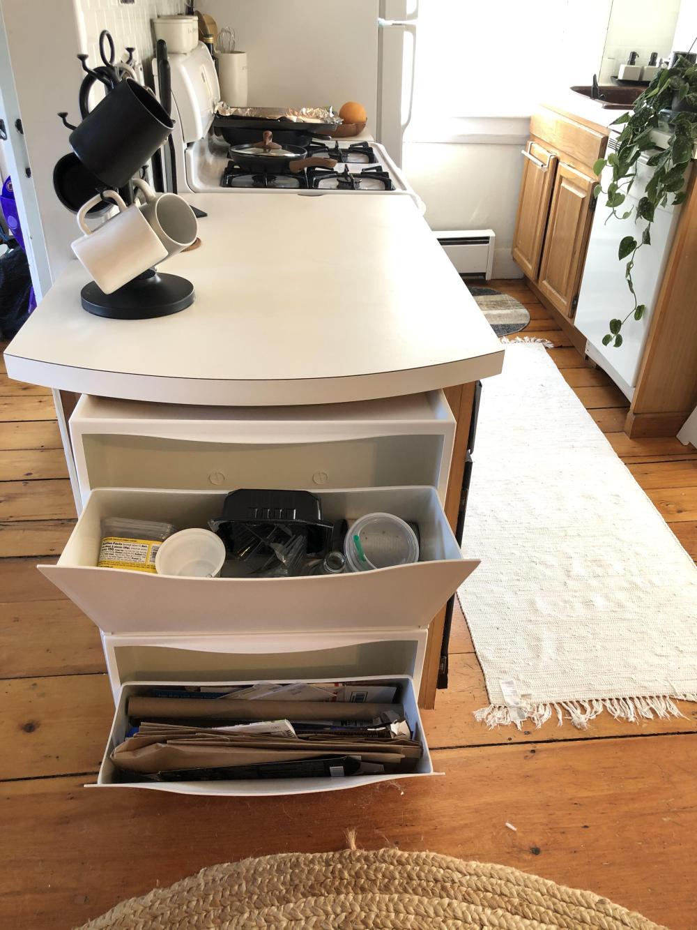 Tilt-Out Compartments Hold Plastic and Cardboard