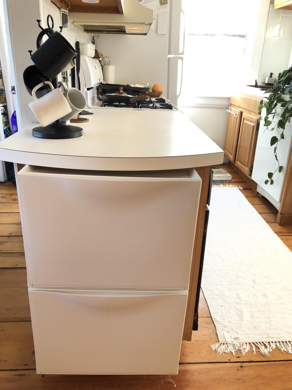 Two Shoe Cabinets Fit Beneath the Kitchen Peninsula