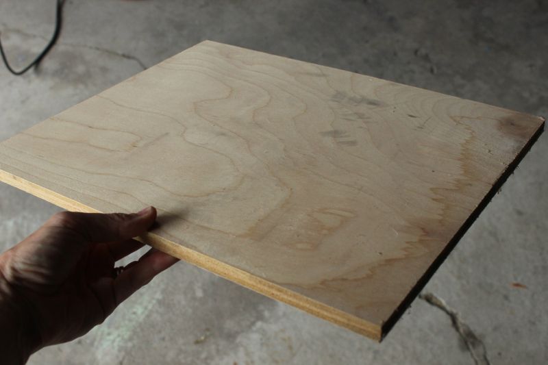 Two cuts give the plywood its tombstone shape