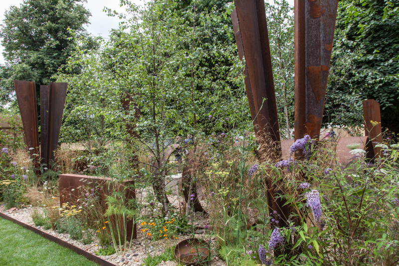 Upright Metal Adds Height Between the Trees