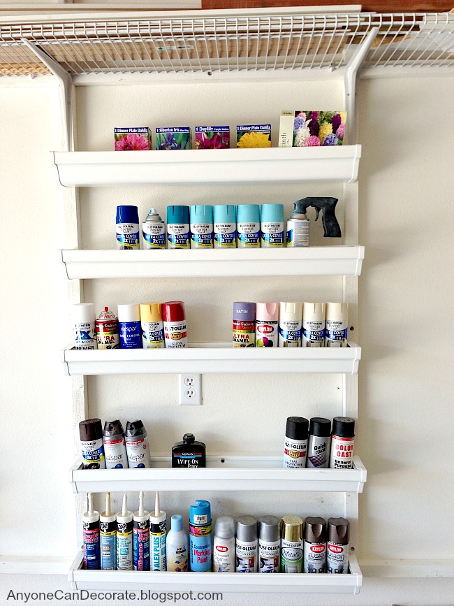 Vinyl Rain Gutters Became Storage for Spray Paint