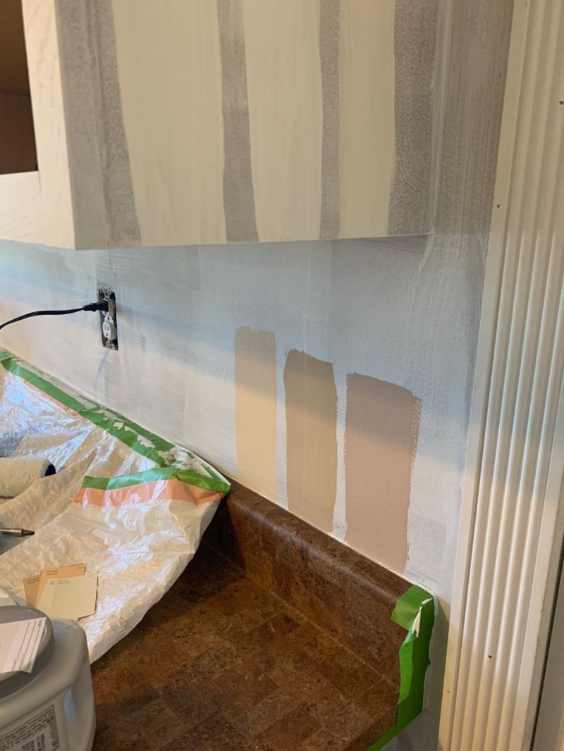 Wall Paint Changed the Color Around the Cabinets