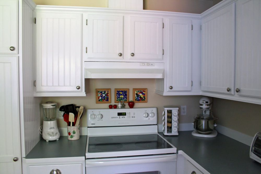 White Cabinetry Framed the Existing Range