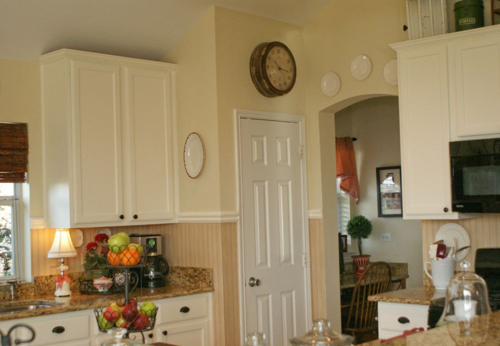 White Paint Replaced the Oak Finish Without New Cabinets