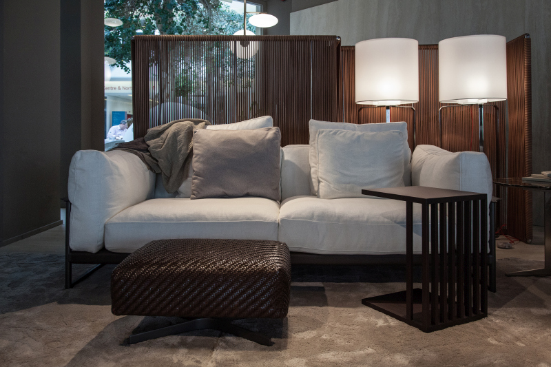 White Upholstery Makes the Woven Ottoman Stand Out
