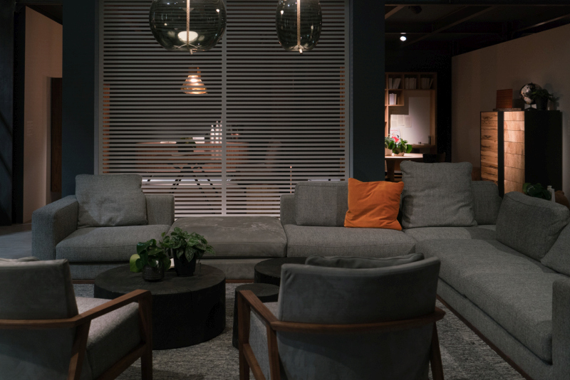 Wood-Framed Chairs Break Up a Gray Sectional