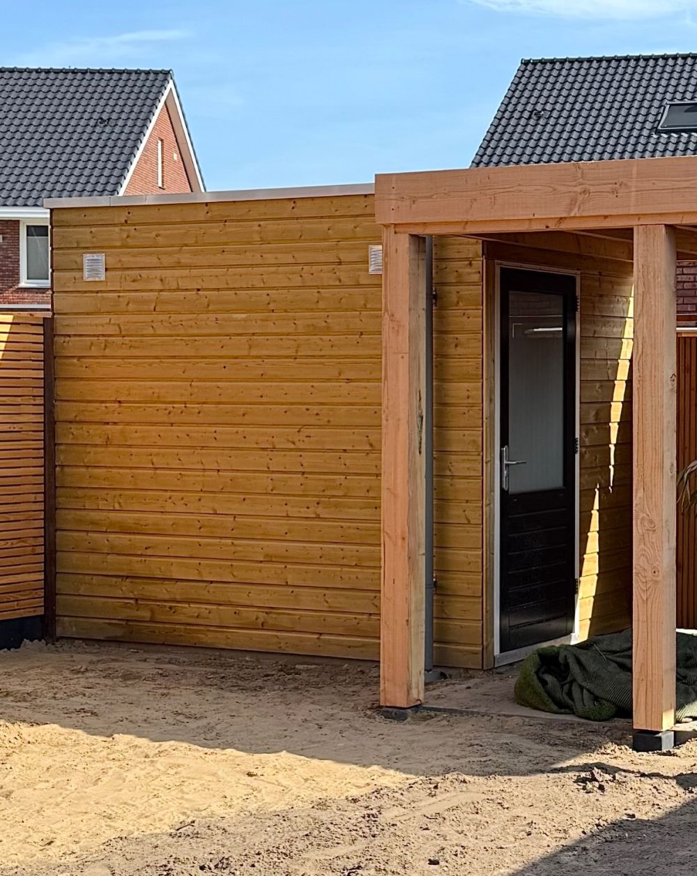 Wooden Cladding Covered the Original Shed