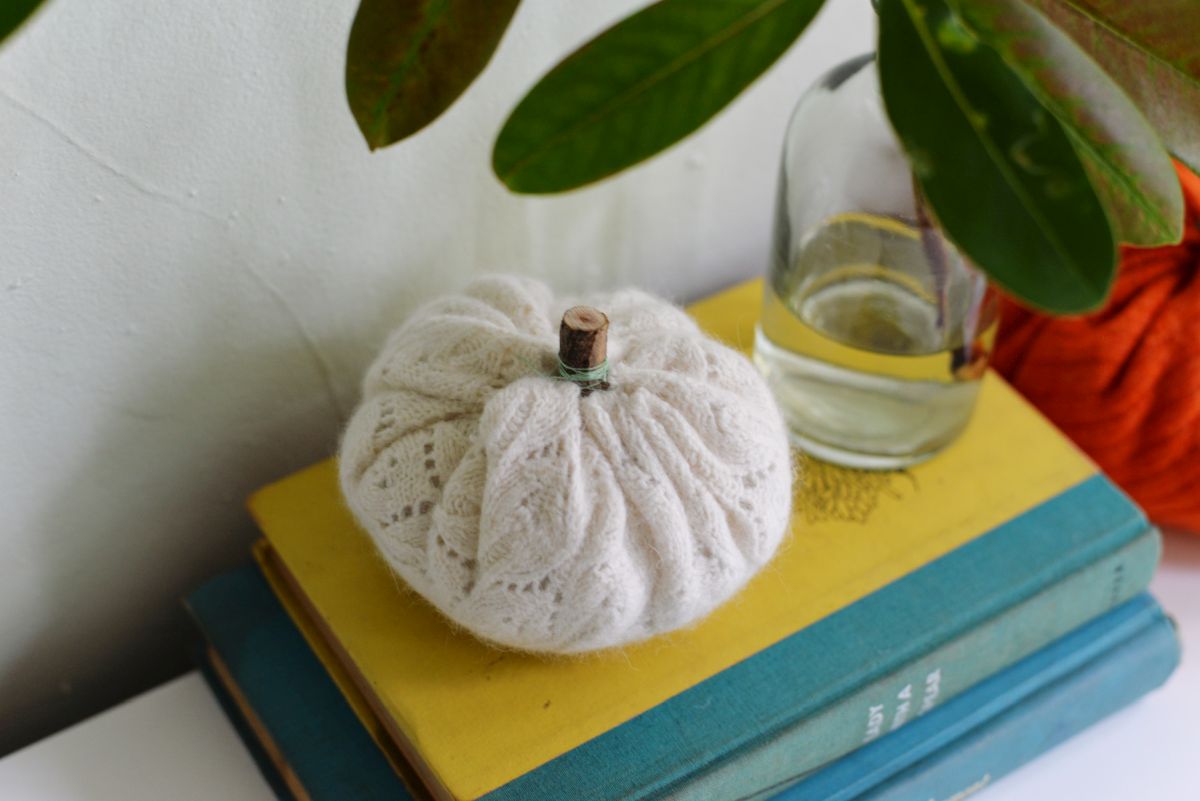 cream pumpkin retained the sweater's cable-knit pattern,