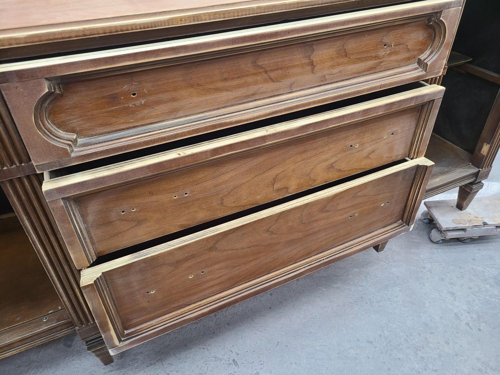 drawer fronts show the original recessed molding