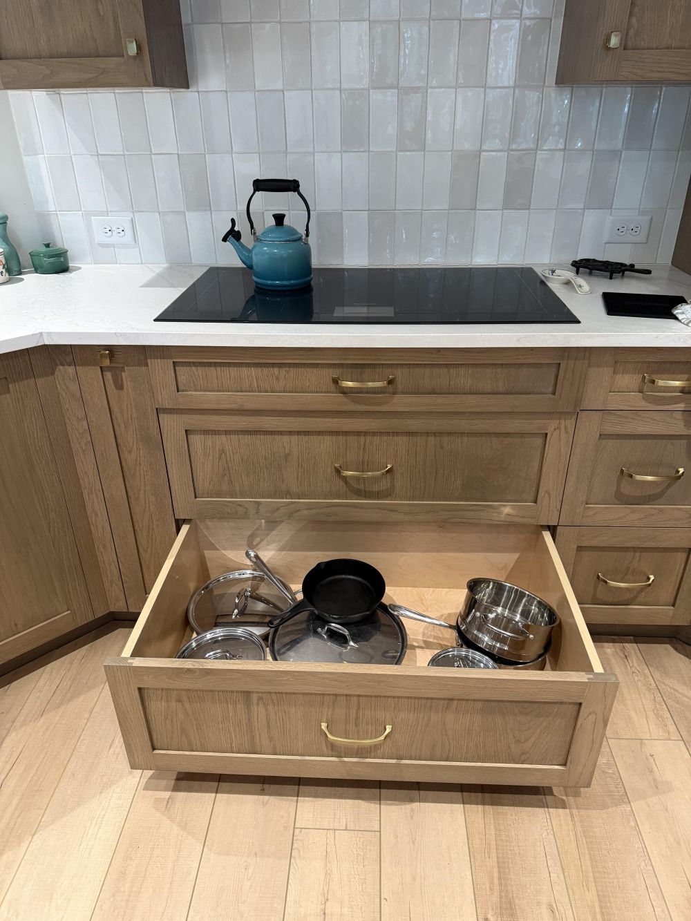 drawer holds stainless steel pots