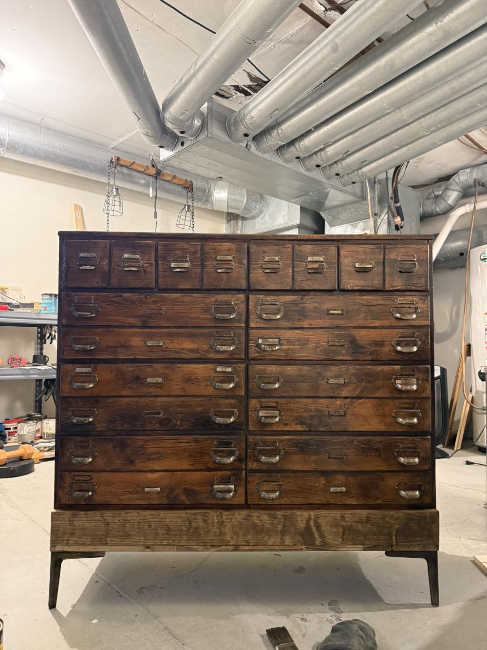finished fronts have aged metal card-holder pulls