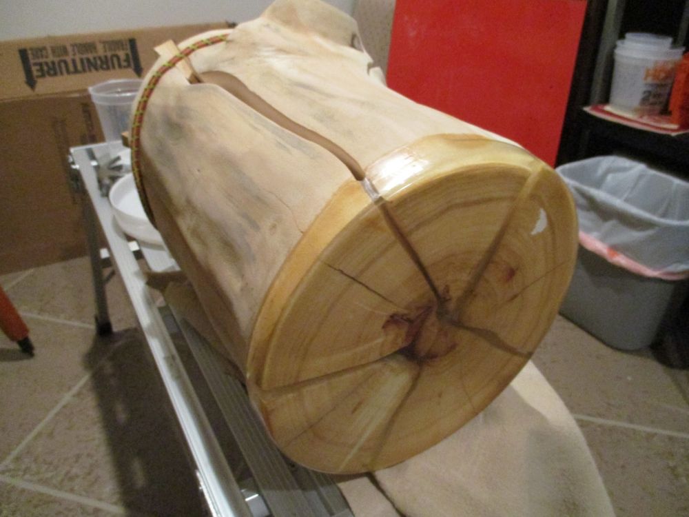 he removed the mold and exposed the resin-covered end