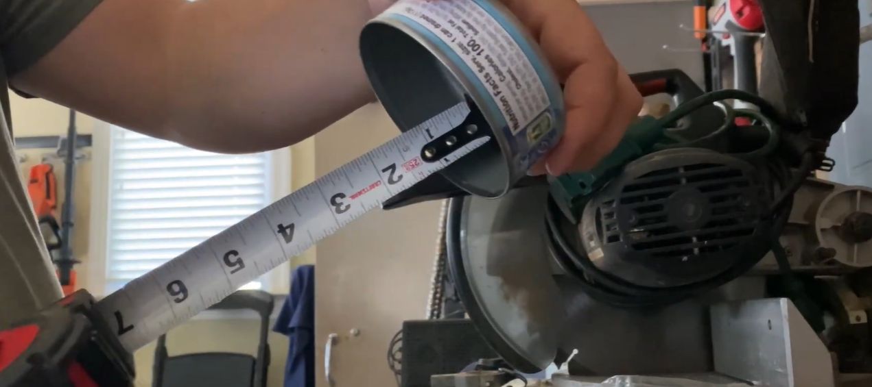 measuring-tuna-can-depth-for-sprinkler-test