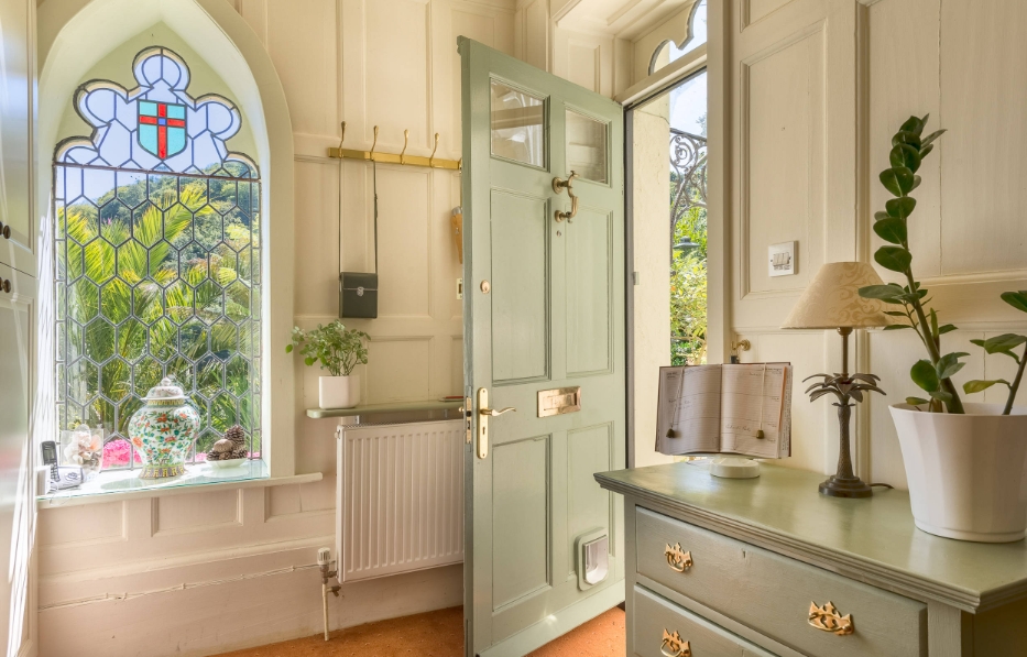 Boosting Your Curb Appeal with a Light Green Front Door