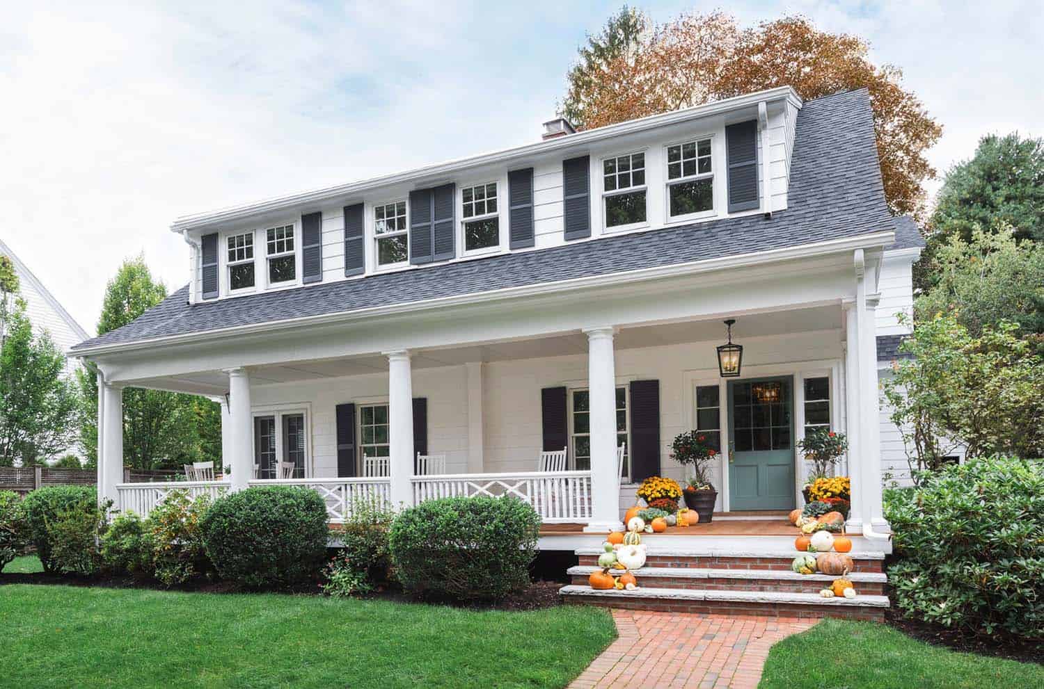 dutch colonial house with porch